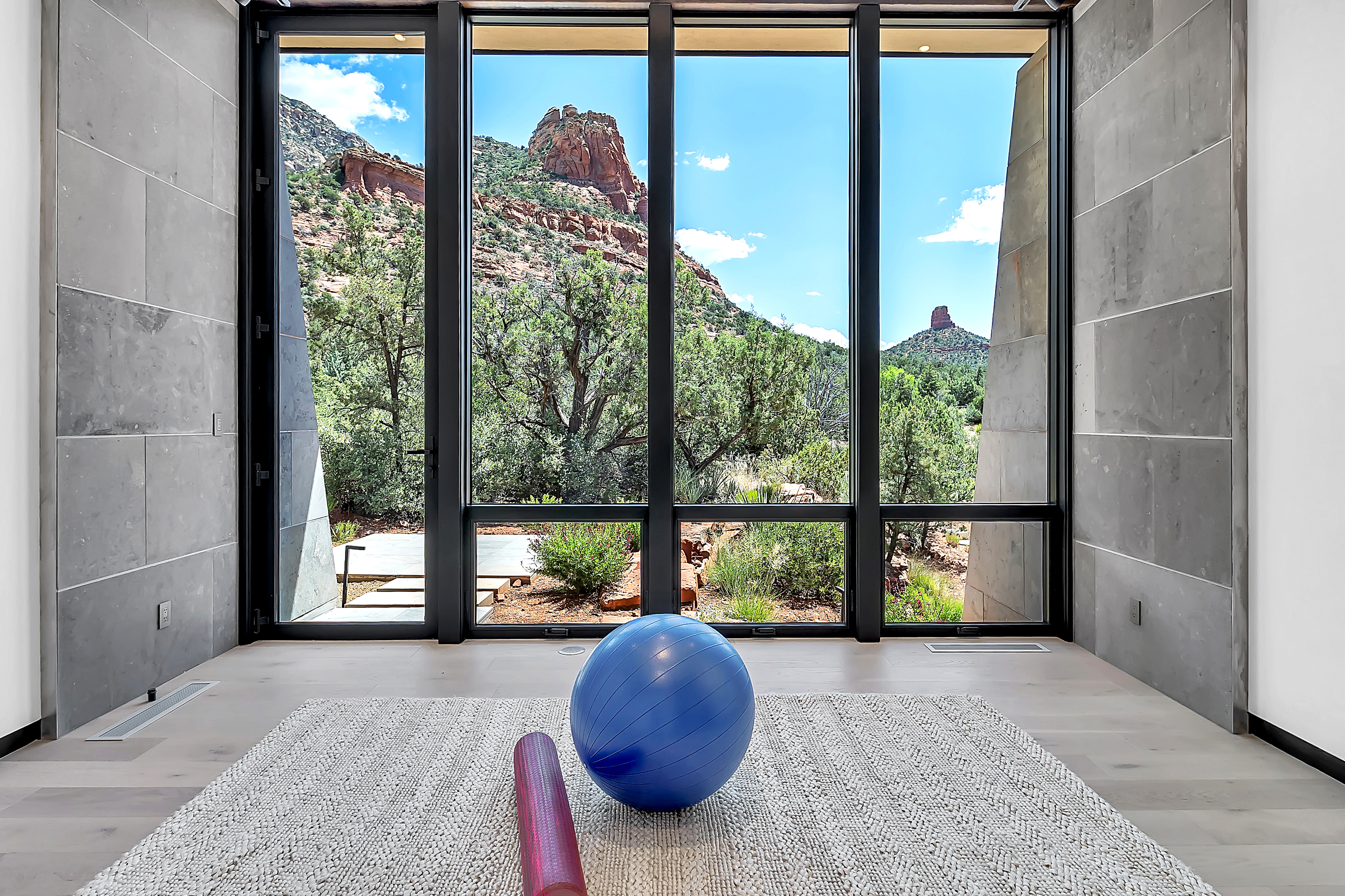 Yoga meditation room with Sedona red rock window view