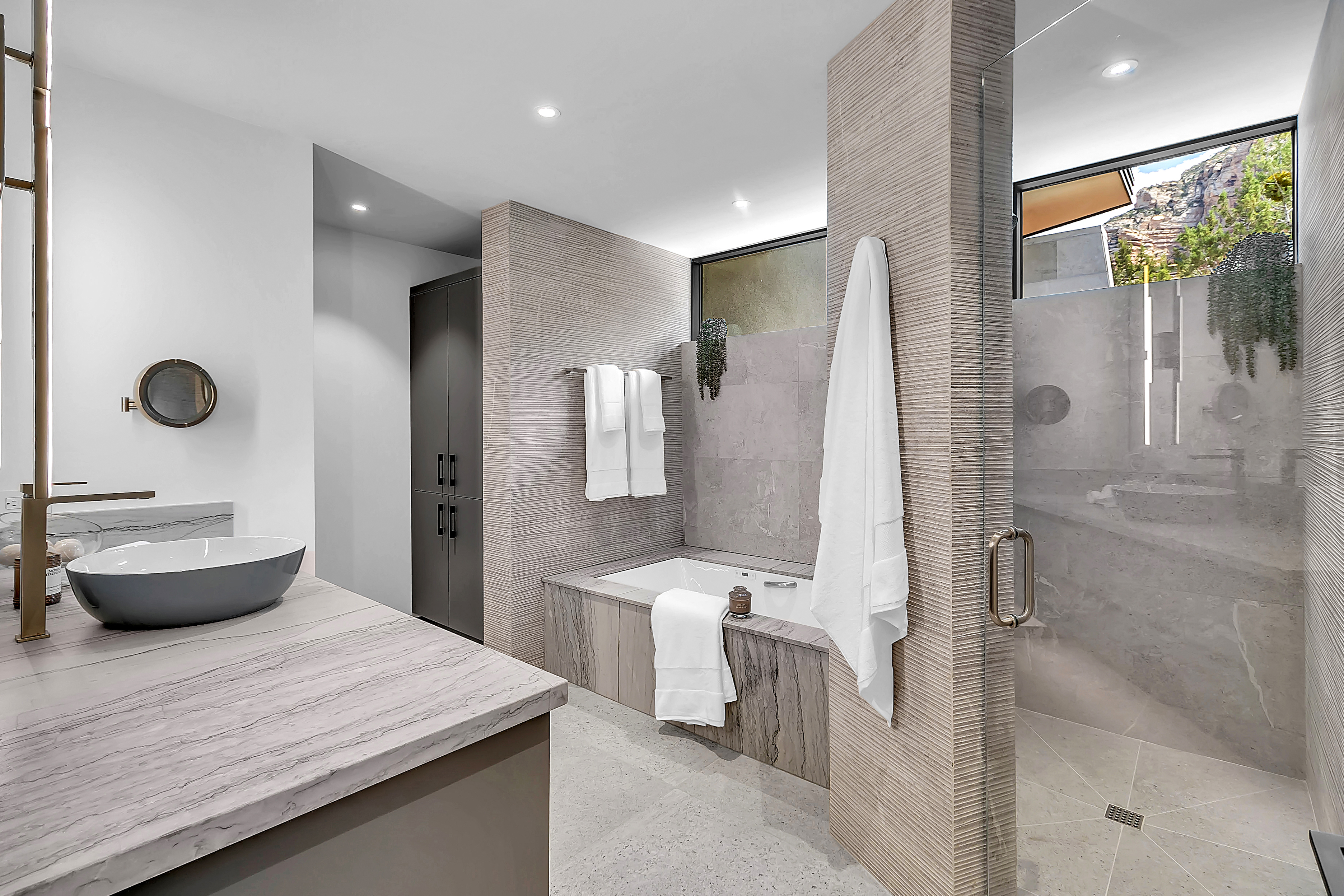 Luxury spa bathroom with marble and soaking tub